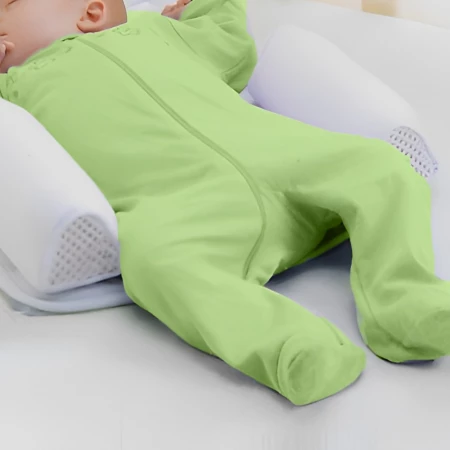 Position fixe de sommeil de bébé et oreiller anti-roulis