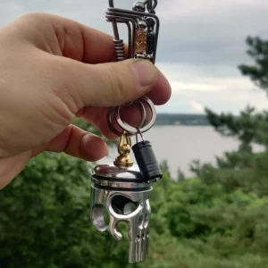 Piston art skull keychain