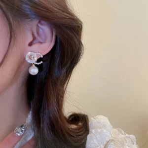 Alternative view of Cuysx Knoix Magnetherapy Earrings