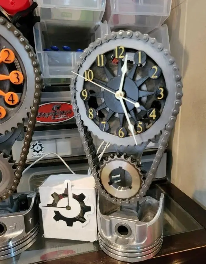 MOTORIZED ROTATING CHAIN CLOCK